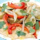 Wraps met geroosterde groenten en spicy hummus